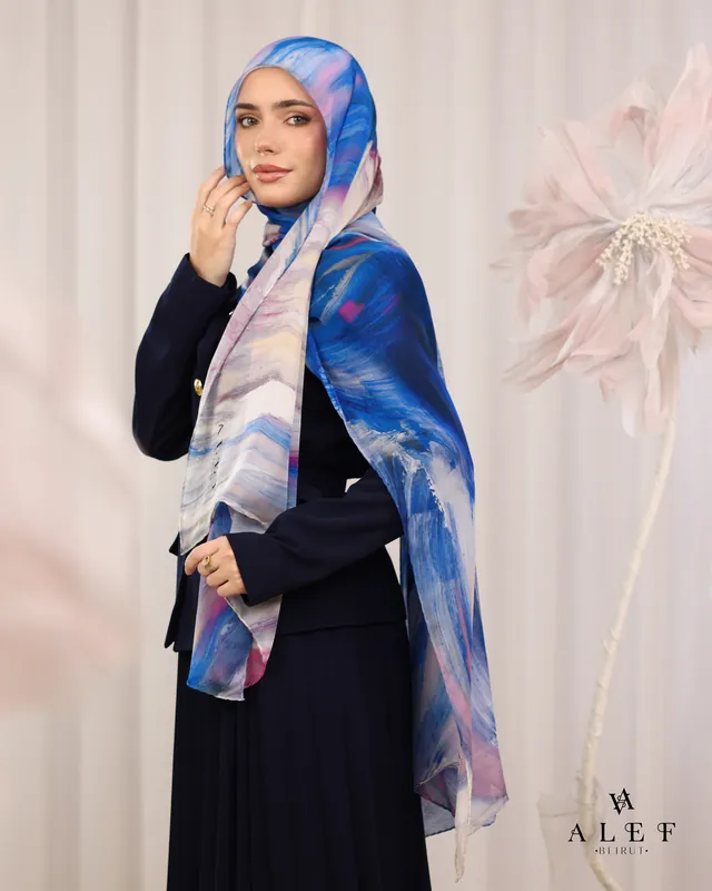 A cobalt-brushed silk over a navy suit